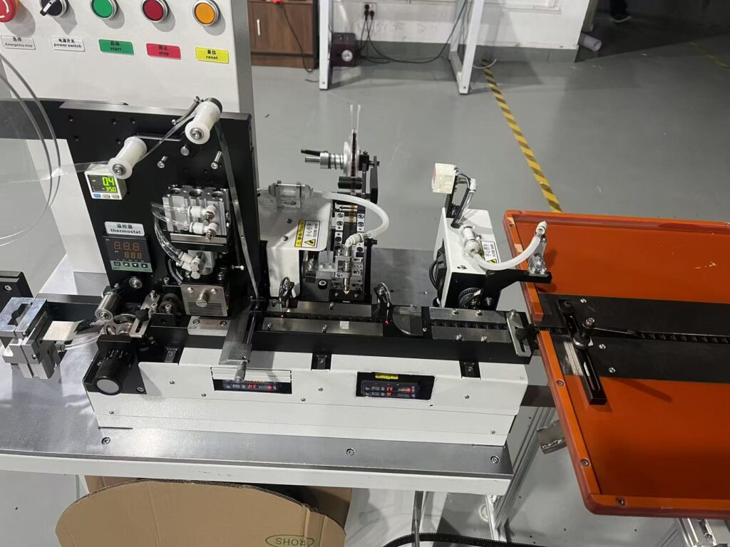 mylar tape attachment machine for connector pins contacts