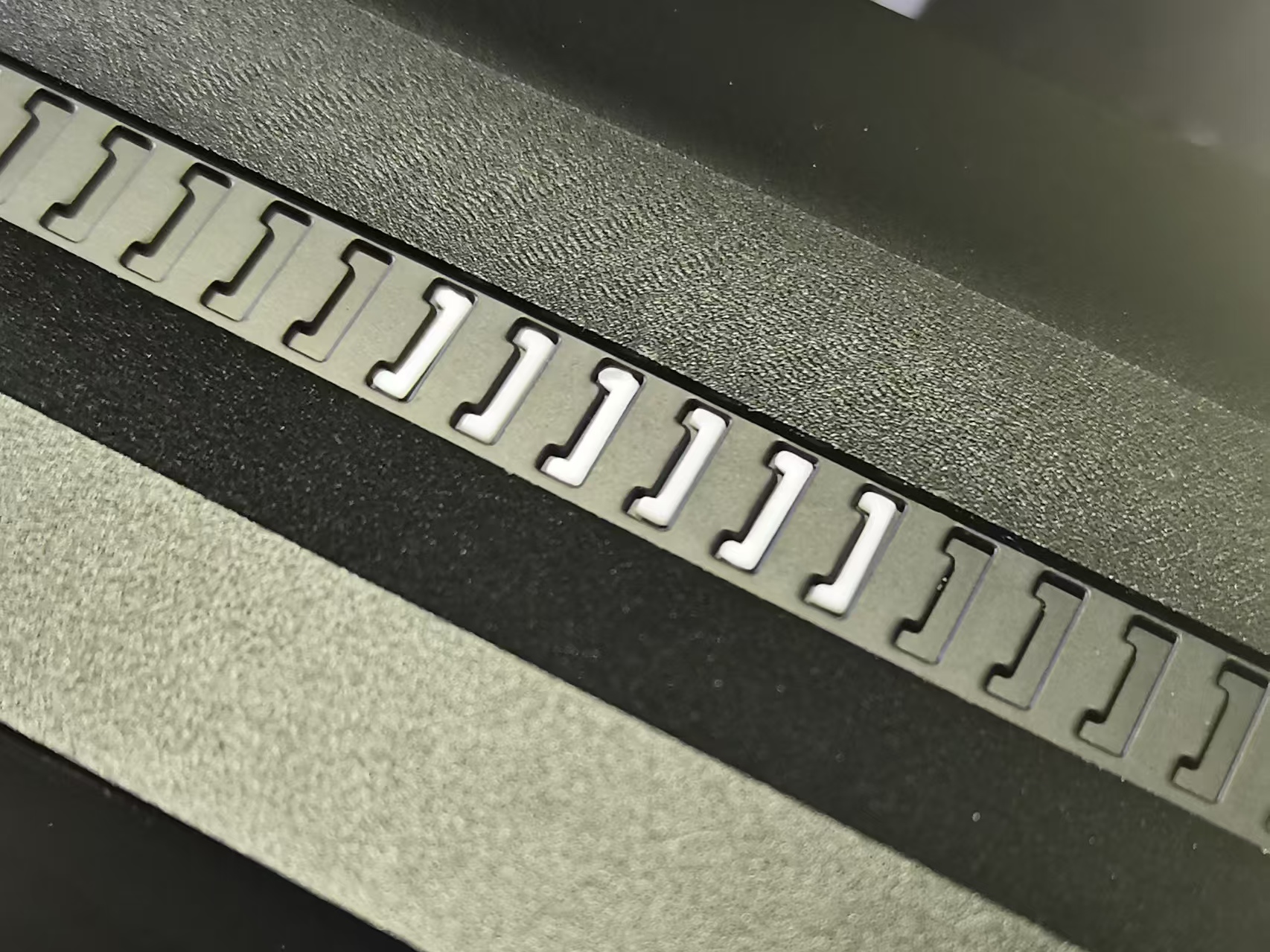 Packing parts in carrier tape using machine